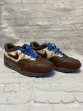 Size 10 Men's Brown Print Nike Tennis Shoe