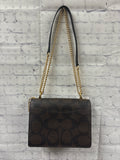 Ladies Brown Print Coach Purse