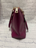 Size Medium Ladies Purple Coach Purse