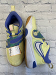 Size 5 Men's Yellow Nike Tennis Shoe