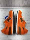 Size 11 Men's Orange New Balance Tennis Shoe